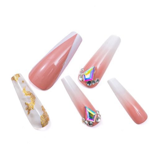 Detailed look at 5 handmade press-on coffin nails, featuring light red, white, and gold glitter with diamonds.