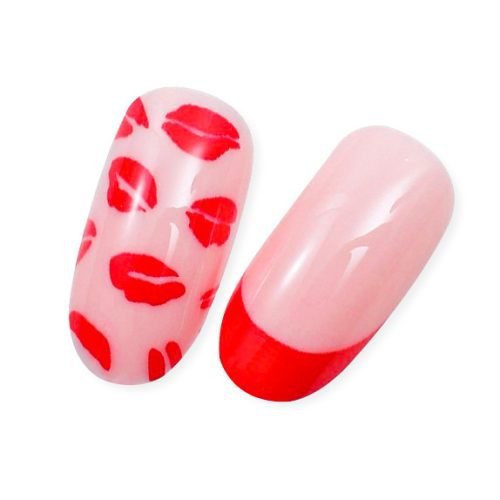 Detailed view of two pieces from a 24-piece set of light pink and red press-on nails with lips design and French tips.