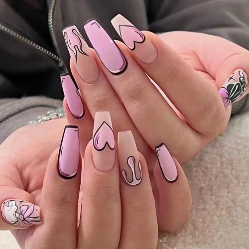 Two hands adorned with a set of light pink and pink mixed press-on nails, featuring cat painting nail art, in a coffin shape.