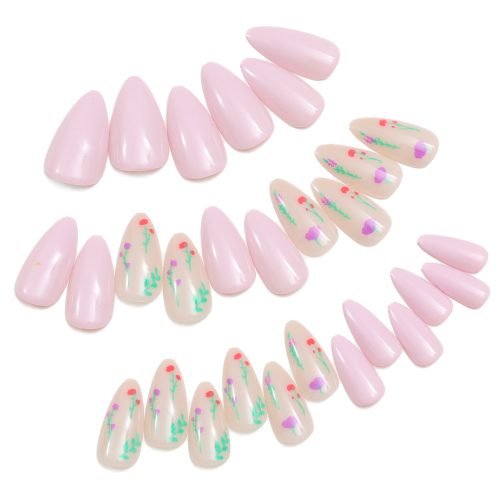 Set of 24 almond-shaped stick-on nails in pink and floral designs on a light base.