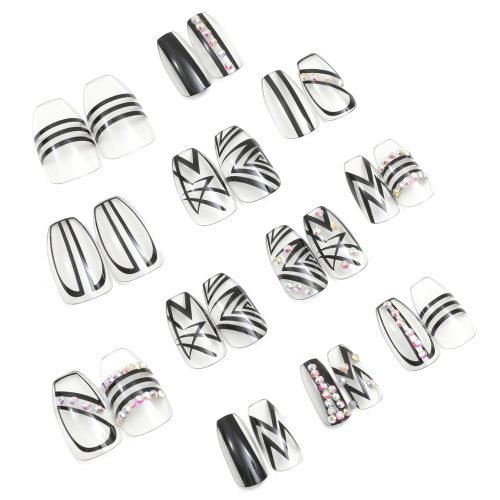 Set of 24 coffin press-on nails in transparent shade, accented with black stripe print and colored diamonds.