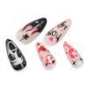 Five almond-shaped press-on nails with Halloween motifs.